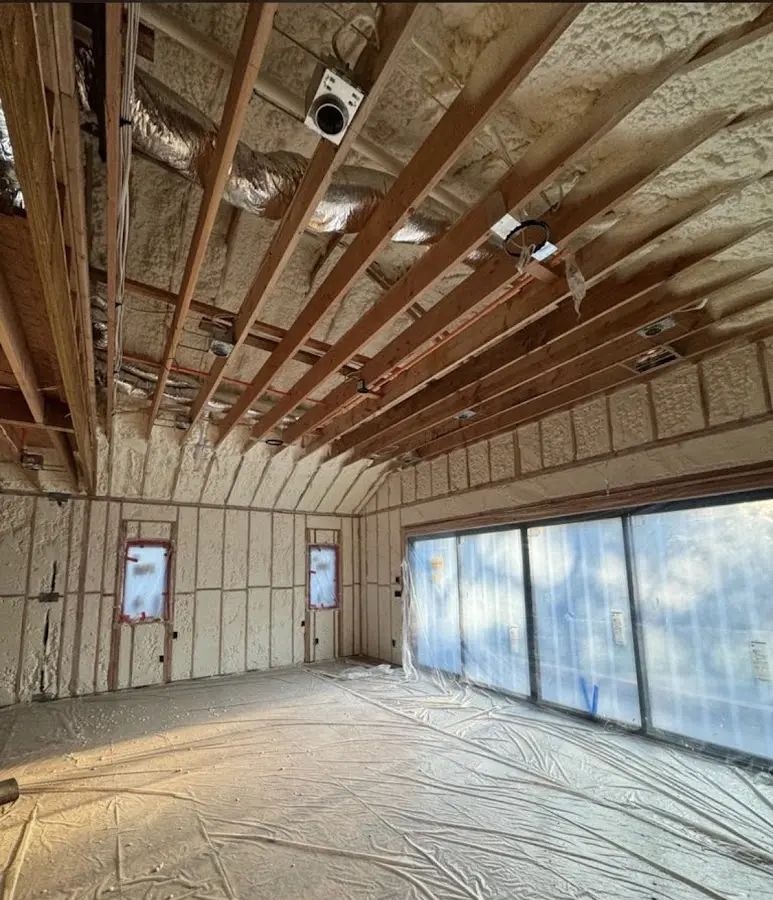 Interior walls and ceiling insulated with spray foam during new construction in Osceola
