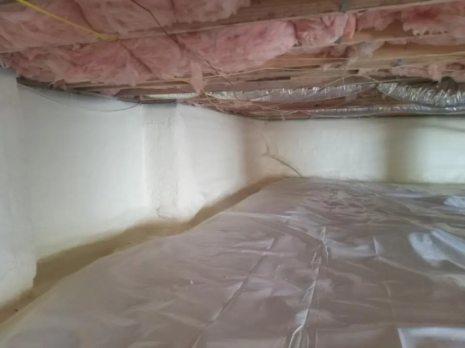 Crawl space encapsulation with closed-cell spray foam for Storm Damage Roof Repair in Osceola